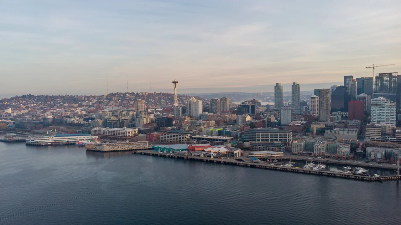 The Seattle skyline and Space Needle above the waterfront piers