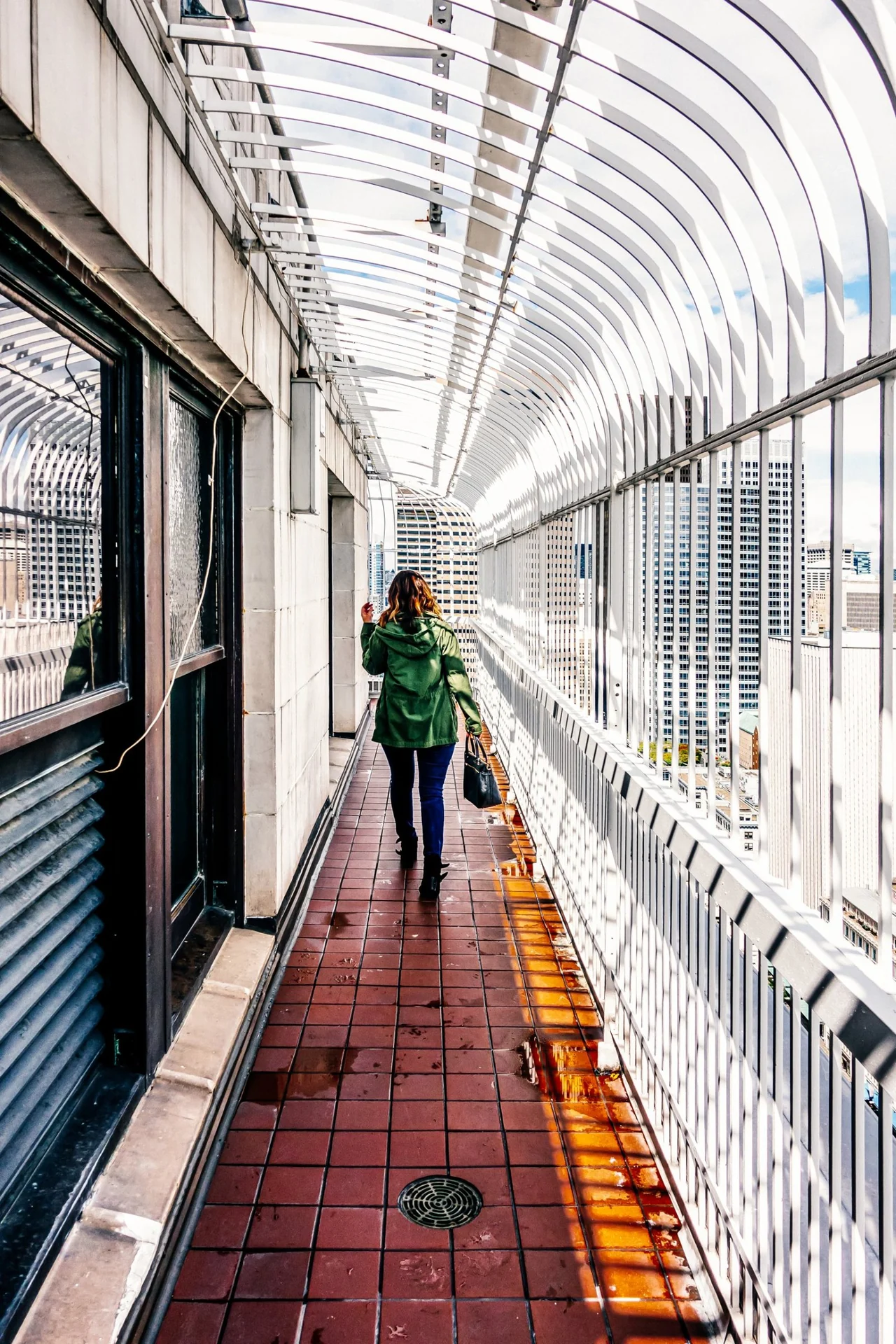 Walking the caged open-air observation deck high above downtown Seattle